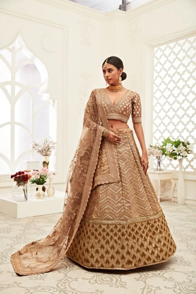 Elegant Brown Slub Silk Lehenga with Zari Embroidery - Rent Now!