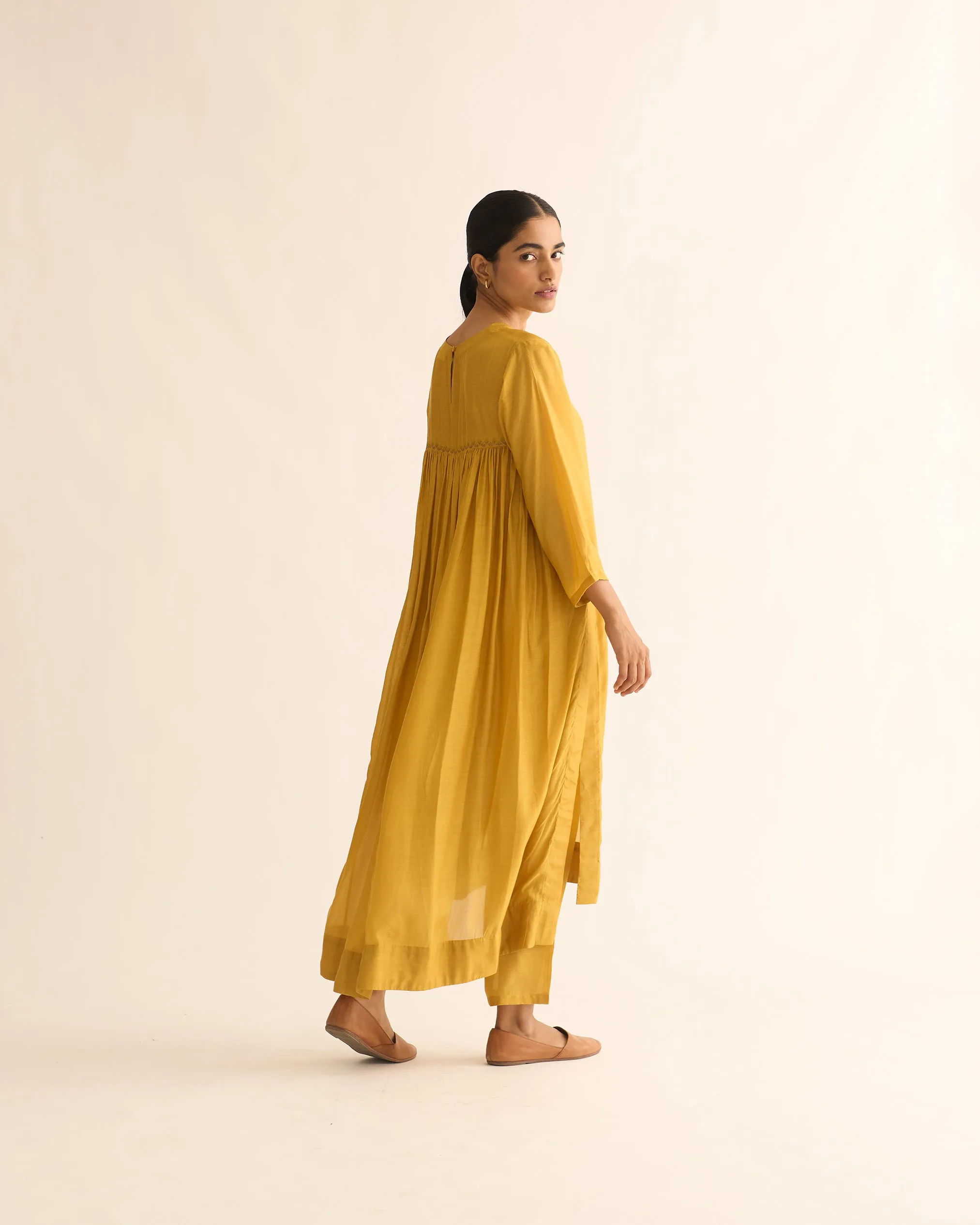 "AVANI MUSTARD BACK GATHER KURTA SET  "